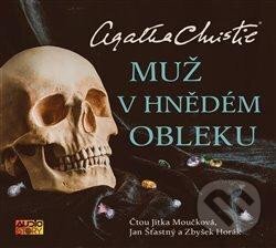 Muž v hnědém obleku
